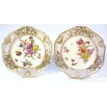 A pair of 19thC Potschapel Dresden cabinet plates, by Carl Thieme, each shaped outline partially