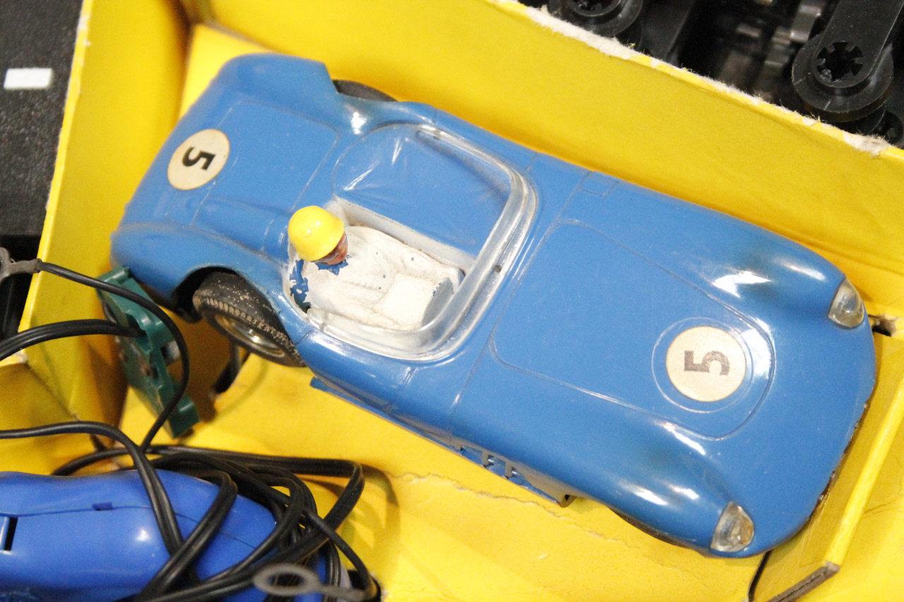 A mid-20thC Tri-ang Scalextric model motor racing set, with blue and red cars, track and - Image 3 of 4