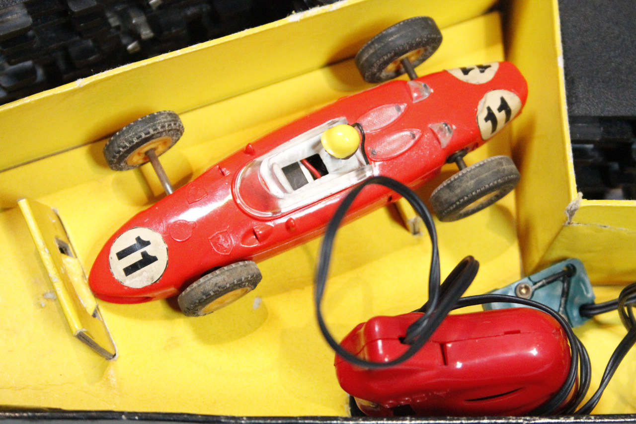 A mid-20thC Tri-ang Scalextric model motor racing set, with blue and red cars, track and - Image 4 of 4