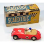A mid-20thC Tri-ang Scalextrix model motor racing Austin Healy 3000, 5cm high. (boxed)