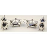 A George VI silver four piece cruet set, by The Adie Brothers, comprising two pepper mills, two open