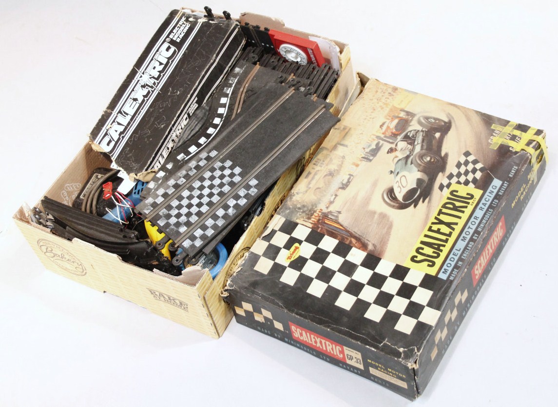A mid-20thC Tri-ang Scalextric model motor racing set, with blue and red cars, track and