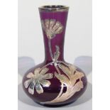 A late 19thC amethyst and overlay glass vase, raised with white metal flowers and leaves, with an