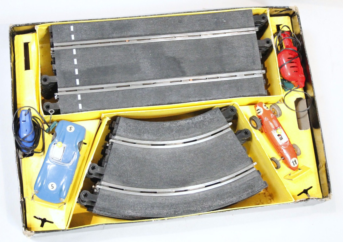 A mid-20thC Tri-ang Scalextric model motor racing set, with blue and red cars, track and - Image 2 of 4