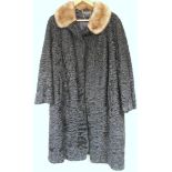 A retro Swakara ladies coat, three quarter length, in textured material with fur collar and cuffs