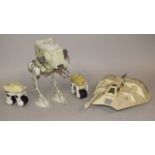 A Lucas film limited Star Wars 1982 edition AT-ST, with articulated legs and other ships and