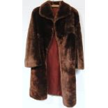 A Martins retro fur style ladies jacket, three quarter length in brown with velvet lining and