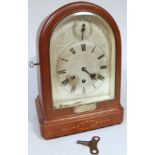 An early 20thC Gustav Becker mantel clock, the stencilled silver back plate with 17cm dia. dial with