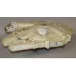 A CPG Kenner 1979 edition Star Wars Millennium Falcon, with lift off lid and articulated interior,
