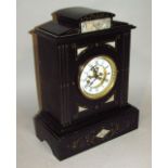 A late Victorian slate and marble mantel clock, the classical case containing a 12cm dia. dial