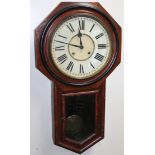 An early 20thC Ansonia New York wall clock, the octagonal case with 29cm dia. dial set with Roman