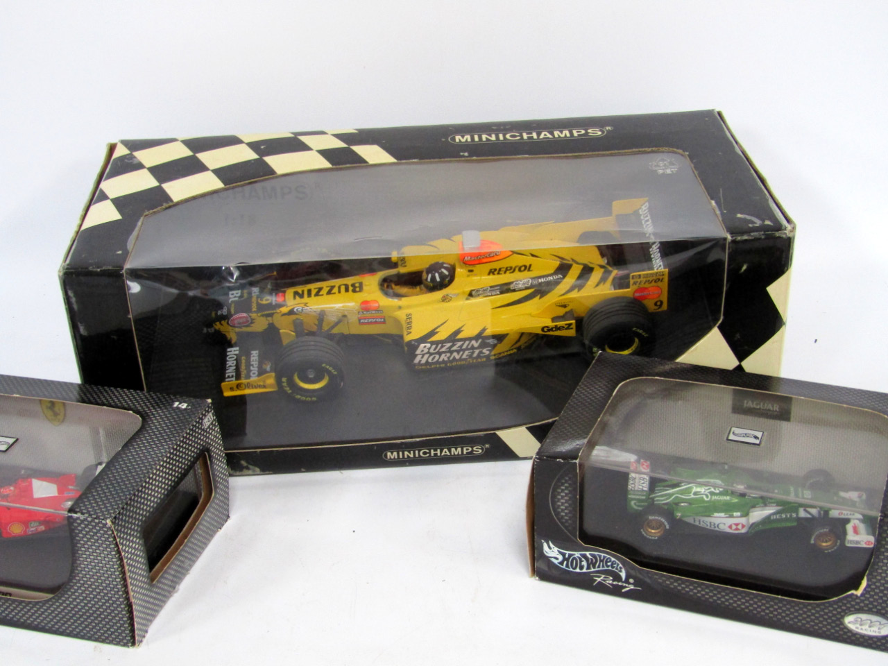 Hotwheels Mini Champ die cast Formula 1 cars, including Jordan Majen Honda 198 driven by Damon