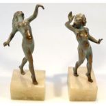 A pair of 20thC Art Deco design metal figure, of nude ladies in dancing poses on rectangular