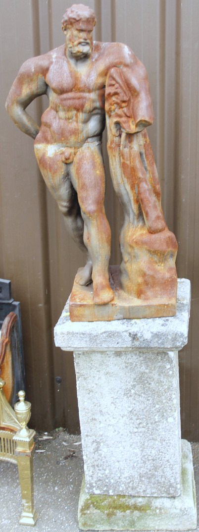 A 20thC moulded stone figure, of Hercules on a concrete base, 151cm high.