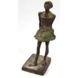 A 20thC metal figure, of a ballerina, the standing figure wearing tutu, 23cm high.