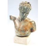 A classical design torso bust, of a gentleman with head lowered, on a plain square marble finish