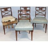 A set of four 19thC mahogany dining chairs, each with reeded cylindrical backs and 'X' stretchers