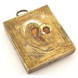 A late 19thC miniature Russian icon, the textured rectangular metal outline set with figures of