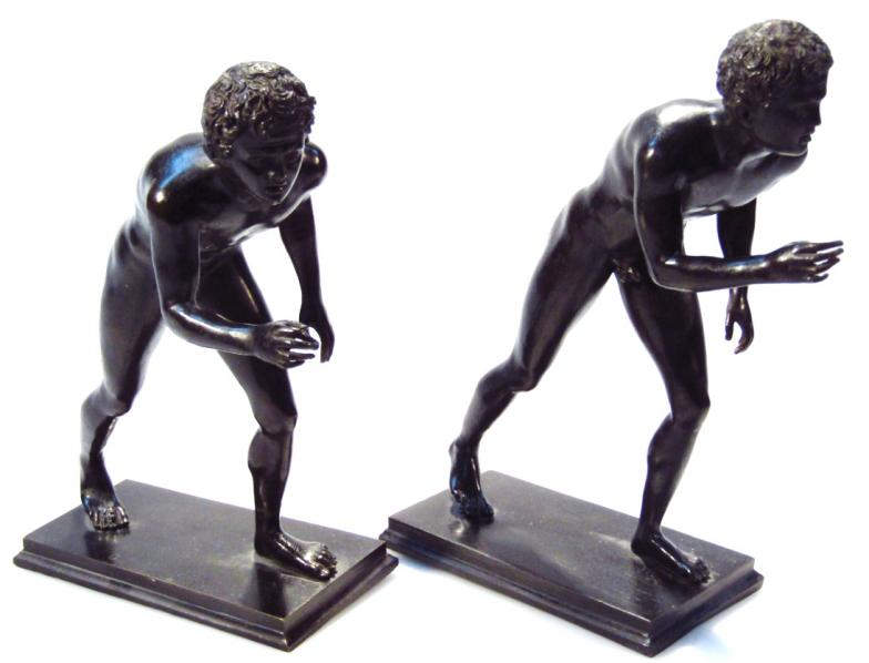 A pair of spelter figure groups of Grecian athletes, on plain rectangular bases, unmarked, 24cm