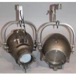 *A pair of Strand electric retro design theatre spotlights, with shaped circular metal cases,