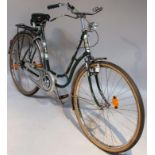 A mid-20thC German Meilter bike, in green with chrome mounts, front light dynamo, etc, c.1953, in