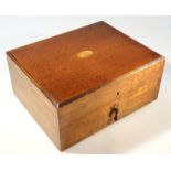 A 19thC oak canteen box, the rectangular lid hinging to reveal a partial red velvet lined