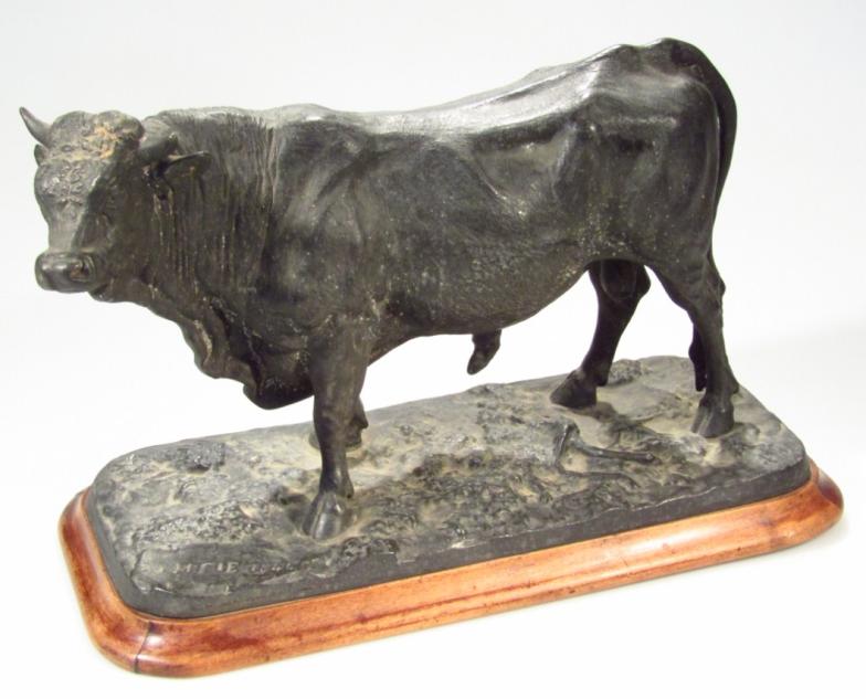 A hollow bronze finish statue, of a Charolais bull, bearing date for 1844, indistinctly signed on