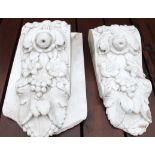 Two reconstituted marble wall brackets, with floral and grape decoration (only one back board)