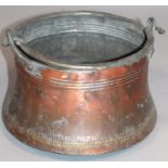 A late 19thC copper cauldron, the inverted circular body with a naive geometric lower banding with