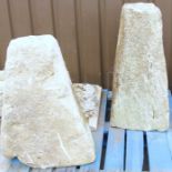 Two staddle stones, and a stone top, 82cm high.