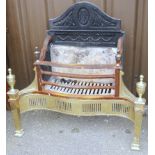 A 19thC brass and cast iron fire grate, 76cm high, 74cm wide.