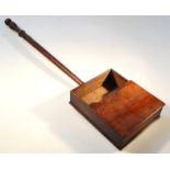 A 19thC mahogany offertory box, the rectangular body fronted by a shaped panel with cylindrical