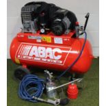 An ABAC Red Line Lt 100 air compressor, on a truckle base, 88cm high, and various other similar