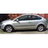 A Ford Focus hatchback 1.6 Zetec, three door with climate pack, 2007, registration EX07WKM, engine