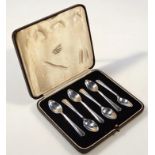 A set of six George VI silver teaspoons, with fan ends and plain bowls, London 1937, 9cm high, in