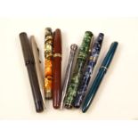 Various fountain pens, to include green and black marble fountain pen with gilt trim, a Swan with