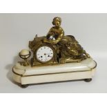 A 19thC French white marble and gilt spelter mantel clock, with eight day movement striking on a