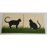 A modern Wemyss Griselda Hill Pottery tile, hand painted with a cat amongst grass in black and