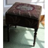 A 19thC mahogany stool, with a square padded woolwork top on slender turned legs, 34cm wide.