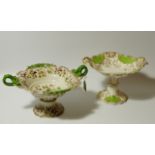 A 19thC Copeland & Garrett comport, the shaped dish in green and white with gilt floral