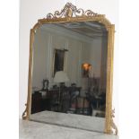 A Victorian gilt gesso overmantel mirror, the foliate crest centred with an oval patera, the