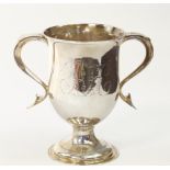 A George III silver twin handle trophy, of baluster form, monogram engraved, London 1784, 11.31oz.