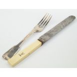 A Victorian silver fork and steel and ivory handled knife set, crest engraved, Charles Boyton II,