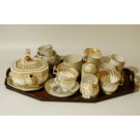 An early 19thC Spode no. 2461 pattern and other part service, to include teapot, 26cm wide, stand,