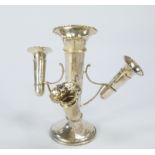 A George V silver table epergne, in the form of a silver vase with three smaller detachable specimen