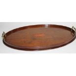 A 19thC Sheraton mahogany oval serving tray, with satinwood oval patera inlay, 60cm.