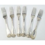 A set of three Victorian silver table forks, decorated in the fiddle, thread and shell pattern,