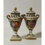 A pair of 19thC Continental pot pourri vases, each hinged lid with gilt orb knop of pierced outline,