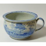 An early 19thC Spode blue and white transfer printed chamber pot, the circular body decorated with