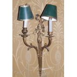 A pair of gilt metal two branch wall lights in Adam style, each cast with ribbons, leaves, patera